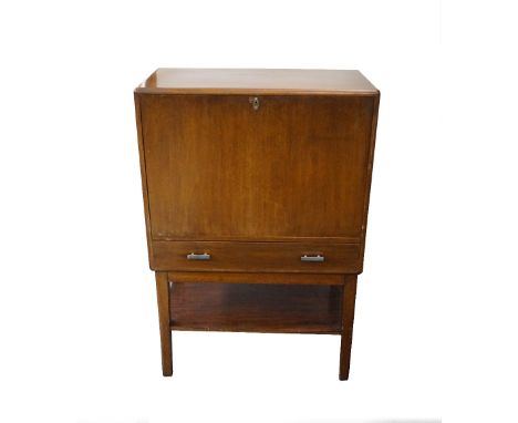 MAHOGANY WRITING DESK
with an inset fall front revealing a fitted interior, above a single drawer with a shelf below, standin