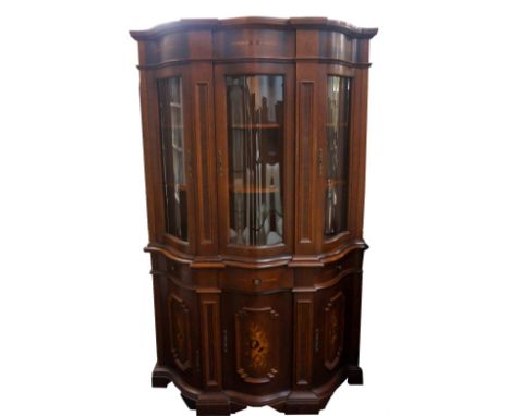 MAHOGANY AND INLAID DUTCH STYLE DISPLAY CABINET
the serpentine glazed upper section with three glazed shaped doors revealing 