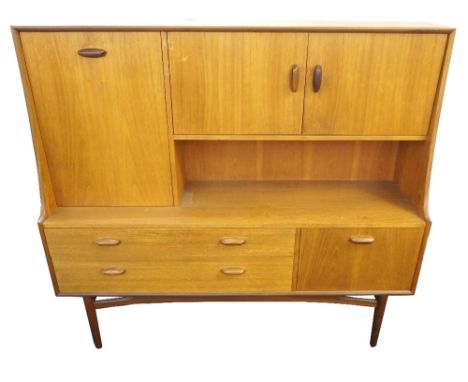 G PLAN TEAK SIDEBOARD
with a pair of cupboard doors and fall flap above an open shelf, with two long drawers and fall flap, s
