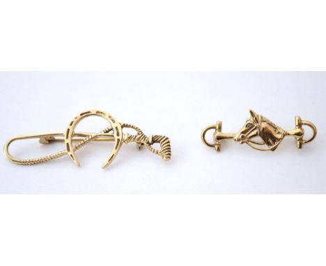 TWO SILVER GILT EQUESTRIAN INTEREST BROOCHES
one formed with a horse shoe and a lunge whip, the other with a horse's head and