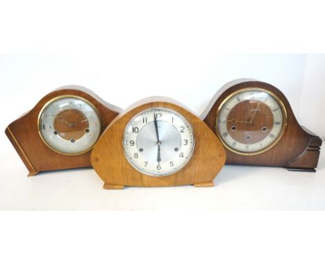 SMITHS MAHOGANY CASED MANTLE CLOCK
of shaped outline with a silvered chapter ring, together with two other mahogany cased Smi