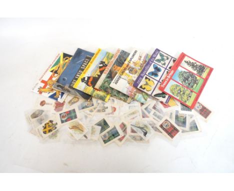 SELECTION OF SILK CIGARETTE CARDS
including World Flags, Military Regiments, Wildlife, Naval Boats, Heraldic Emblems, Ceramic