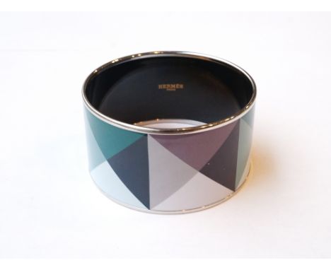 HERMES ENAMEL BANGLE
of attractive geometric design in purple, turquoise and grey tones, 7cm diameter