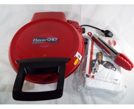 A Flavor Chef by Flavorstone, model No. TSK - 2309ABPZ - V, unused with tongs and instructions. estimate £15 - £25