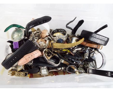 A large quantity of wristwatches to include Fantasy, Timex, Mizz, Keepsake, Umbro, Reflex, Next, a quantity of watch batterie