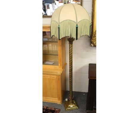 An early 20th-century Brass Standard Lamp, with a 1920s shade