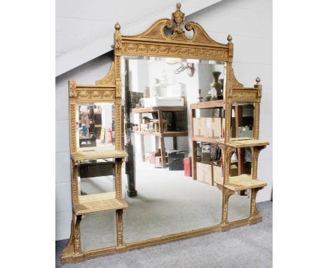 A Victorian Three Glass Over Mantle Mirror, with swan neck pediment and central urn finial and having two pairs of flanking v