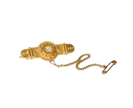 A 15 Carat Gold Diamond Brooch, with locket compartment to the reverse, length 4.4cmThe approximate qualities of the diamond 