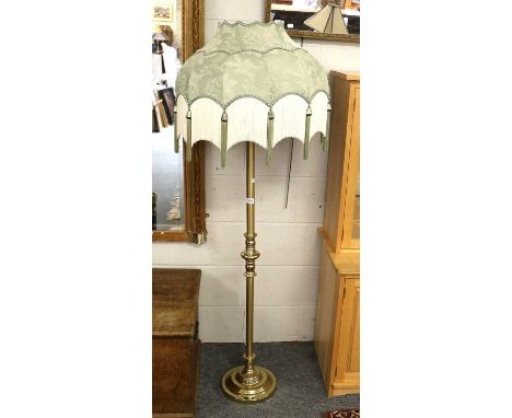 A Brushed Brass Standard Lamp, of Column Form, with faceted and tasseled damask shade, 157cm high 