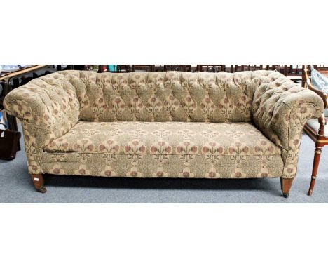 A Chesterfield Sofa, recovered in button fabric, 193cm by 85cm by 72cm 