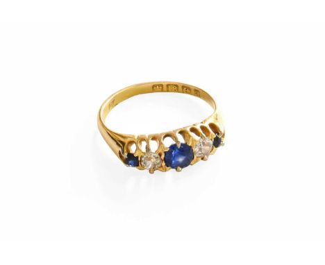 An 18 Carat Gold Sapphire and Diamond Five Stone Ring, three round cut sapphires alternate with two old cut diamonds, in yell