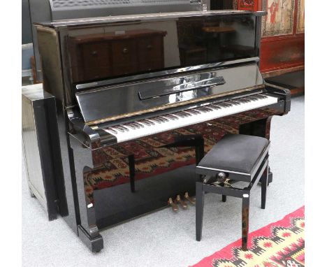 An Ebonised Kawai Upright Overstrung Piano, stamped to the frame K1474764 model KS-5F, retailed by J Wood and Sons Ltd, Bradf