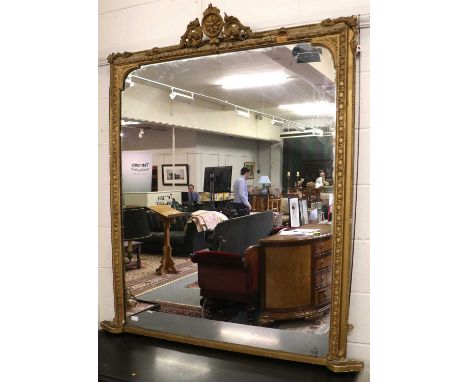 A 19th Century Style Gilt Framed Mirror, the bevelled rectangular plate within a conforming frame, decorated with flowers and