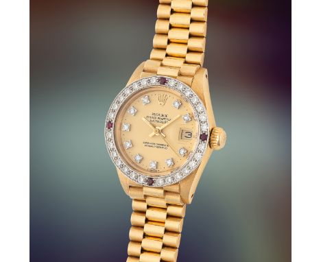 A LADY'S FINE & RARE 18K SOLID GOLD, DIAMOND & RUBY ROLEX OYSTER PERPETUAL DATEJUST BRACELET WATCHCIRCA 1983, REF. 6906/8 WIT