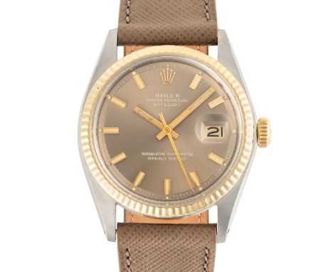 A GENTLEMAN'S SIZE STEEL & GOLD ROLEX OYSTER PERPETUAL DATEJUST WRIST WATCHCIRCA 1973, REF. 1601 WITH RARE GREY "WIDE BOY" DI