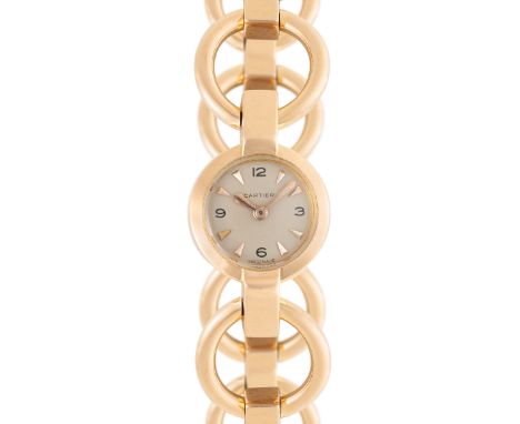 A LADY'S 18K SOLID PINK GOLD CARTIER BACK WIND BRACELET WATCHCIRCA 1950sMovement: 17J, manual wind, signed Cartier.Case: Diam