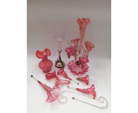 A late 19th Century ruby glass table garnitures for table decoration along with other ruby glass items.1 item cracked others 