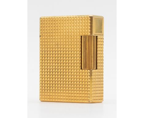 A boxed gold-plated Dupont lighter, with embossed decoration, length approx 47mm, marked S.J Dupont Paris, EX5138  PLEASE NOT