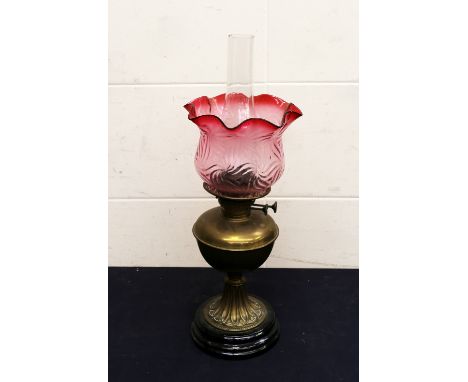 Victorian oil lamp and cranberry shade