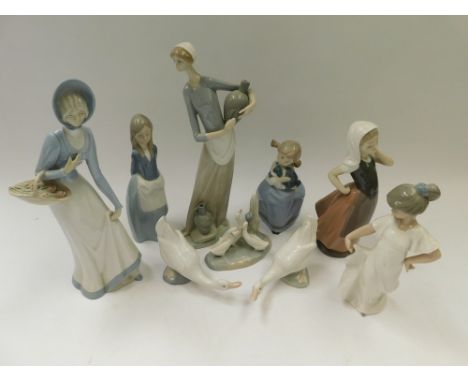 Nine ceramic figures , to include 1 Lladro lady , 1 Porcelanas Miquel Figure together with 7 Nao figures 3 of which are Bird 
