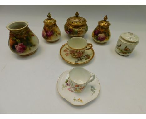 An early 20th Century Royal Worcester pot puri dishes with floral still life by M.Hunt along with cups and saucers and a lidd