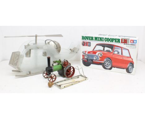 A boxed Tamiya 1:12 Scale Rover Mini Cooper 1.3i kit; together with an unboxed Mamod Steam Tractor; and unusual helicopter li