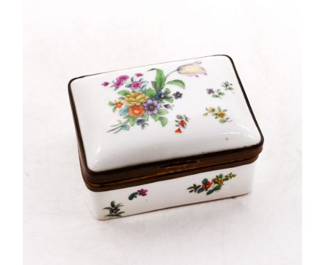 A continental porcelain 19th Century table snuff box with floral detail and classical scene on inside lid.