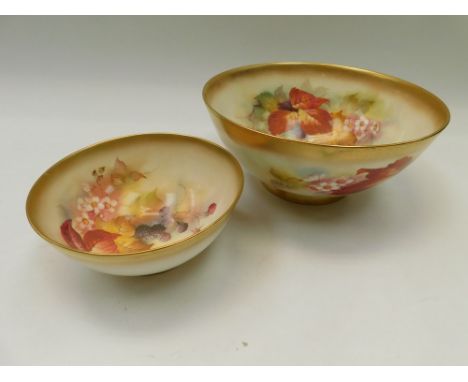 Two early 20th Century hand painted Royal Worcester bowls with still life scenes by K. Blake, with gilt finish.