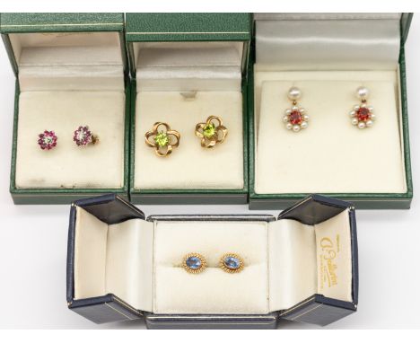 A collection of four pairs of 9ct gold stone-set earrings, including a pair of oval sapphire earrings with fancy border, leng