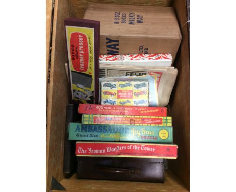  A vintage arched early 20th Century chest containing vintage board games and model paint.