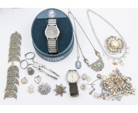 A collection of items including a pair of silver sugar nips, together with costume jewellery including paste set jewellery, a