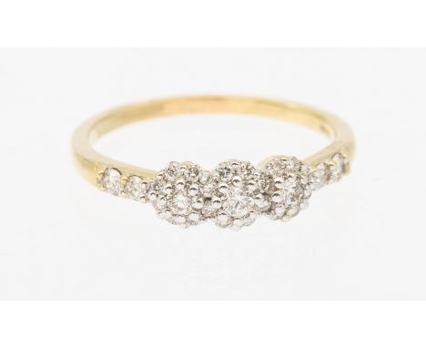 An Australian diamonds, diamond and 9ct gold ring, comprising three flower clusters of claw set round brilliant cut diamonds,