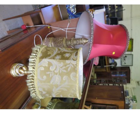 A gilt plaster Renaissance style table lamp, 40cm high, and a putti form table lamp