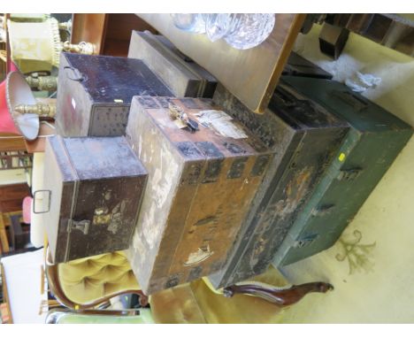 Four metal trunks, a timber trunk and a tuck box (6)