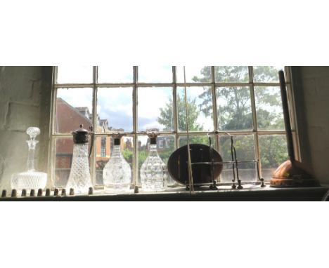 Two decanters with later silver collars, a decanter and claret jugs, various other collectables