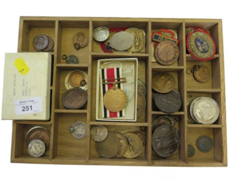 A collection of rifle shooting medallions and a special constable medal