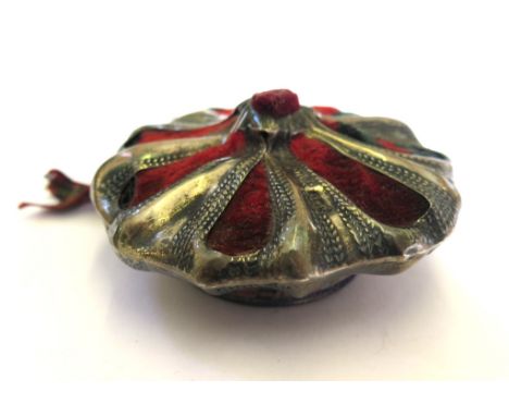 A silver pin cushion in the form of a Scottish bonnet