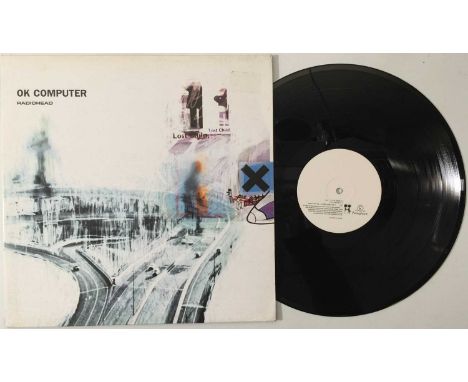 RADIOHEAD - OK COMPUTER LP (ORIGINAL UK COPY - PARLOPHONE NODATA 02). An extremely well presented original UK copy of the ico