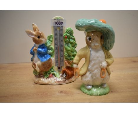 A Royal Albert Beatrix Potter 'Benjamin Bunny' figure sold together with Peter Rabbit in the form of a thermometer.