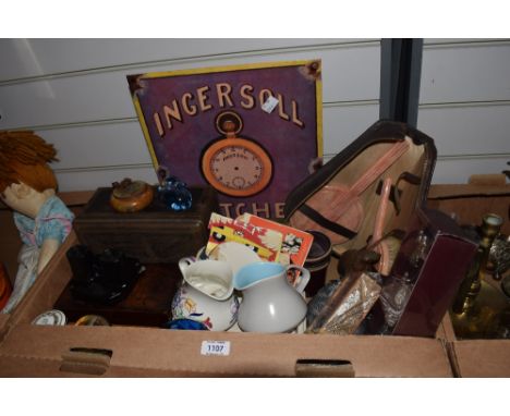 A miscellaneous selection of items including two Poole Pottery jugs, a vintage Art Deco travelling brush and mirror set, two 