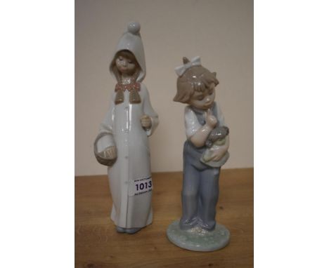 A Lladro porcelain figurine 'Shepherdess with Basket' number 4678 sold alongside a Nao by Lladro porcelain figurine 'Hush Now