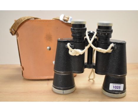 A pair of Zenith 7 x 50 coated optic triple tested binoculars with original leather case, h19cm.