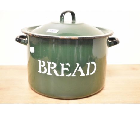 A vintage green enamel bread bin.