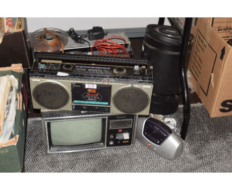 A selection of assorted vintage audio equipment including a Grundig reel to reel player, an ALTIUS wireless speaker, an AIWA 