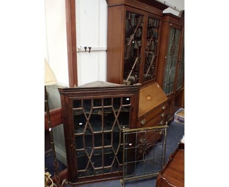 A GEORGE III OAK HANGING CORNER CABINET with prettily glazed door , and old green painted interior, with an Edwardian bureau-