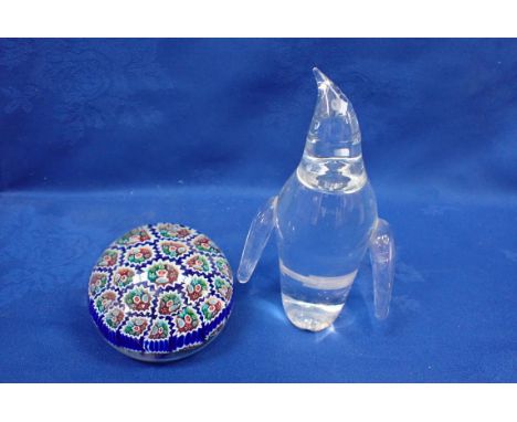 A GLASS MILLEFIORE PAPERWEIGHT with a Steuben glass Penguin