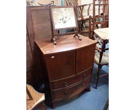 A GEORGE III MAHOGANY BOW-FRONT COMMODE fitted two drawers and a pair of doors (converted to a cupboard), and a small dressin