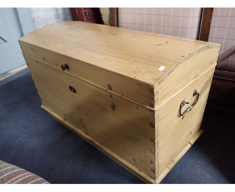 A LARGE PINE TRUNK, WITH IRON HANDLES 52 x 95cm (plus handles)
