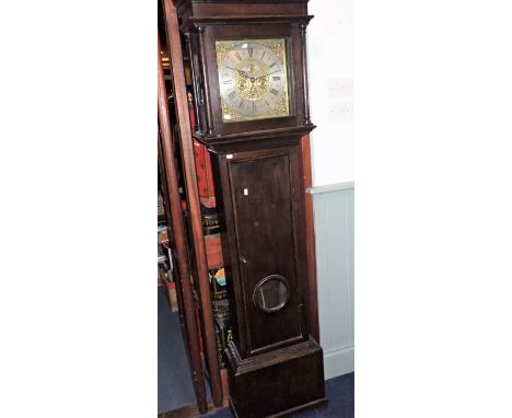 AN OAK-CASED EIGHT-DAY LONGCASE CLOCK, THE 30CM DIAL SIGNED 'DANIEL SIMONDS 1723' the plain case with lenticle to the door (a