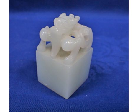 A CHINESE WHITE 'JADE' SEAL 6cm high